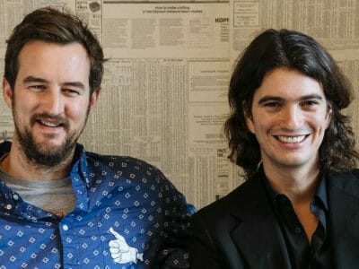 WeWork founders Miguel McKelvey and Adam Neumann are all smiles after HSBC signs up for space in HK