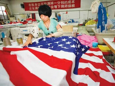 Making flags in China is okay, but some in the US want China's SOE to stop buying American companies